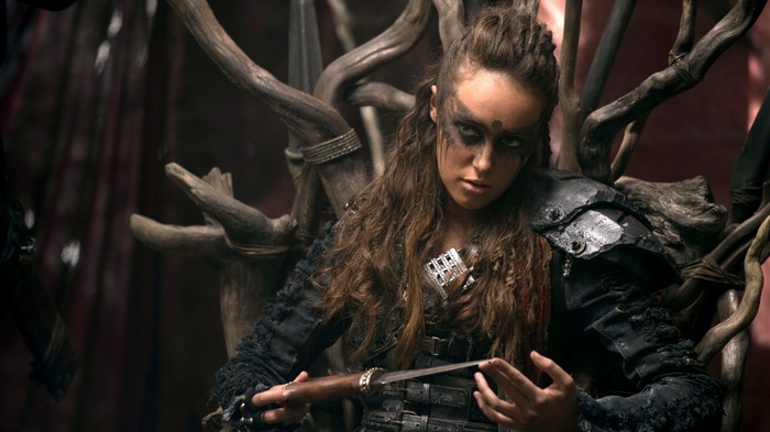 Alycia Debnam-Carey as Commander Lexa on a throne