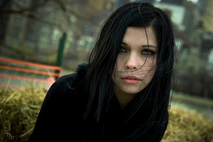 Rachel Dashae brunette woman in black coat