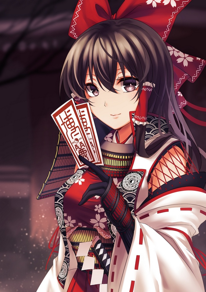 Hakurei Reimu from Touhou holding talismans