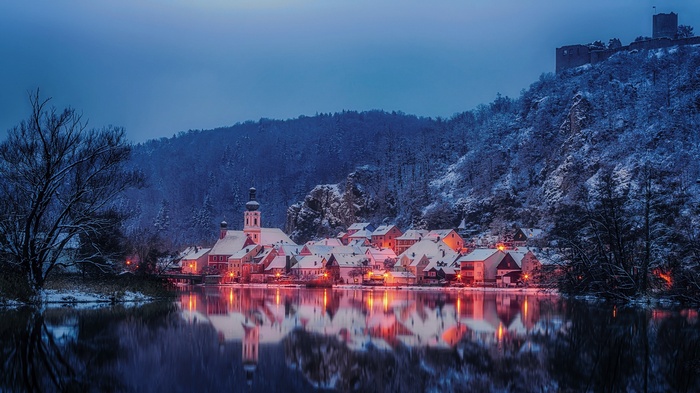 Winter village with castle ruins in Bavaria, Germany