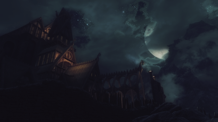 The Elder Scrolls V: Skyrim night scene with moon and clouds