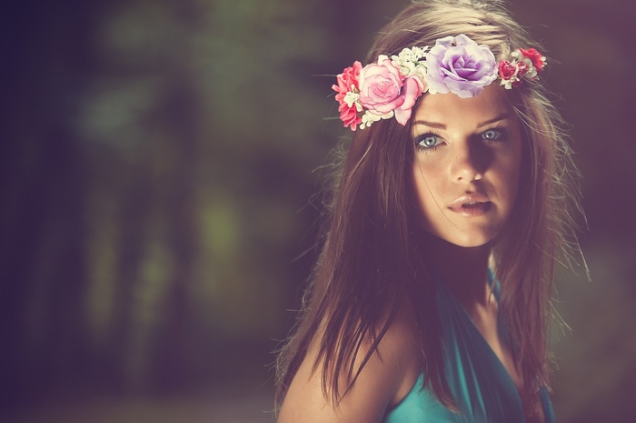 Woman with flower crown in portrait