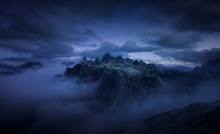 Misty Mountains in the Alps at Dusk