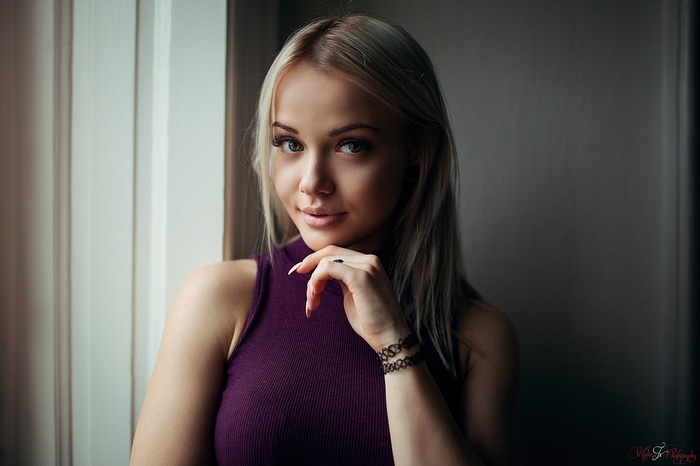 Portrait of a blonde woman by Misho Jovicic