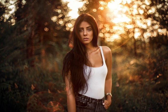 Julia Carina in white top at sunset