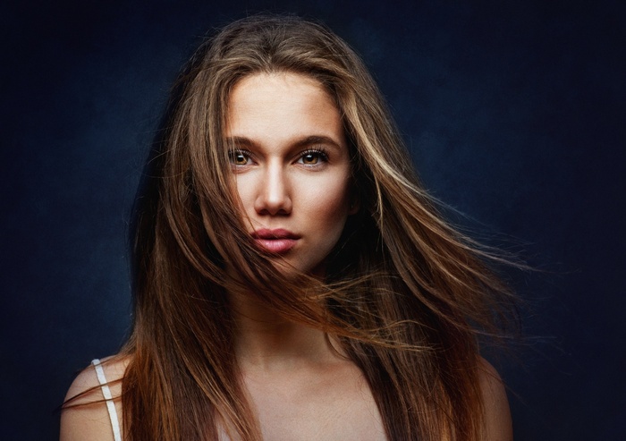 Portrait of a young woman with flowing hair