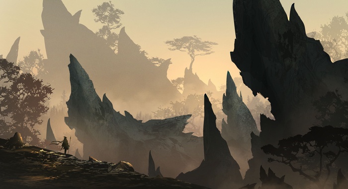 Fantasy warrior with spear in misty rocky landscape