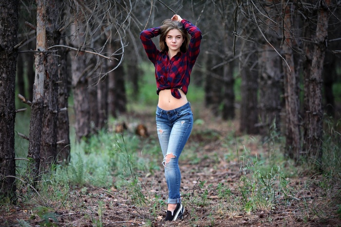 arms up, torn jeans, sneakers, women outdoors, pants, shirt, portrait, women, belly, trees