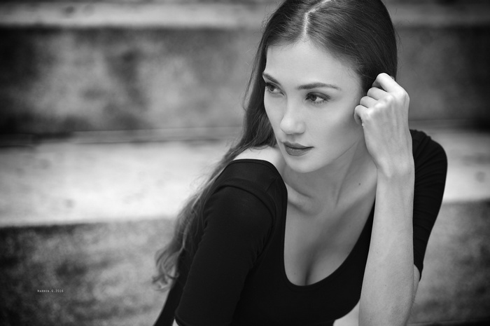 Monochrome portrait of a woman with long hair