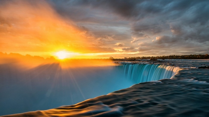 Niagara Falls at sunset with dramatic clouds