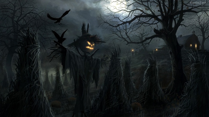 Scary Jack O Lantern Scarecrow in a Haunted Field