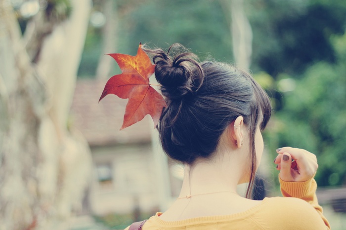 Woman with a leaf in her hair