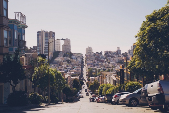 San Francisco cityscape with steep streets and cars