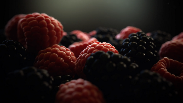 Close-up of fresh raspberries and blackberries