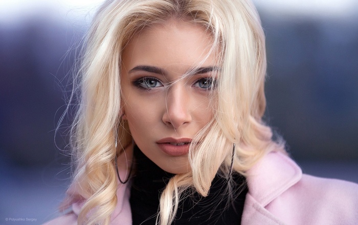 Portrait of a blonde woman with blue eyes