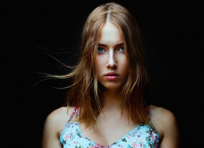 Portrait of a young woman with blonde hair