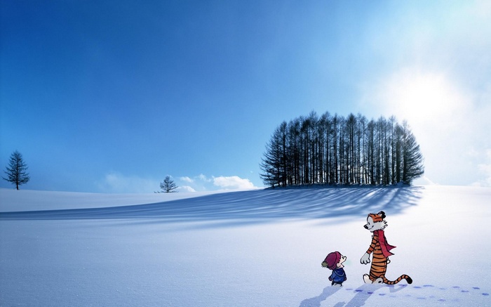 Calvin and Hobbes walking in a snowy landscape