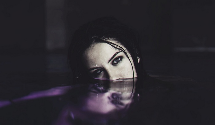 Aurela Skandaj emerges from dark water