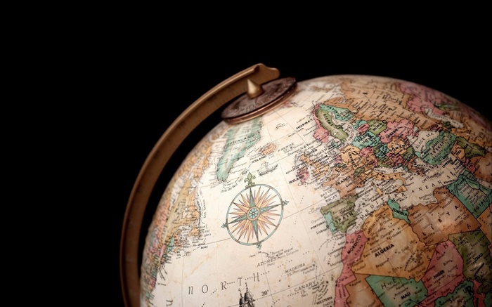 Close-up of a vintage globe showing Europe and Africa