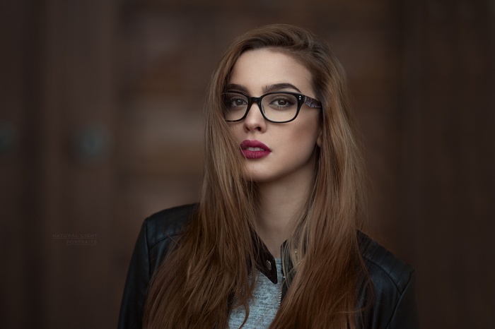 Portrait of a woman with glasses by Robert Chrenka