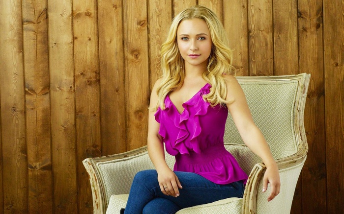 Hayden Panettiere sitting in a chair