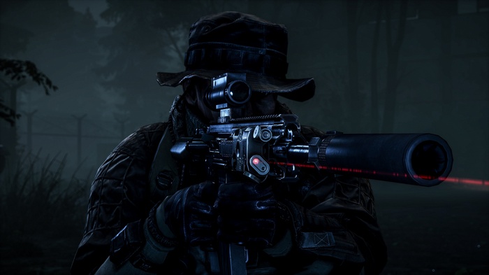 Soldier aiming a rifle with a laser sight in Battlefield 4