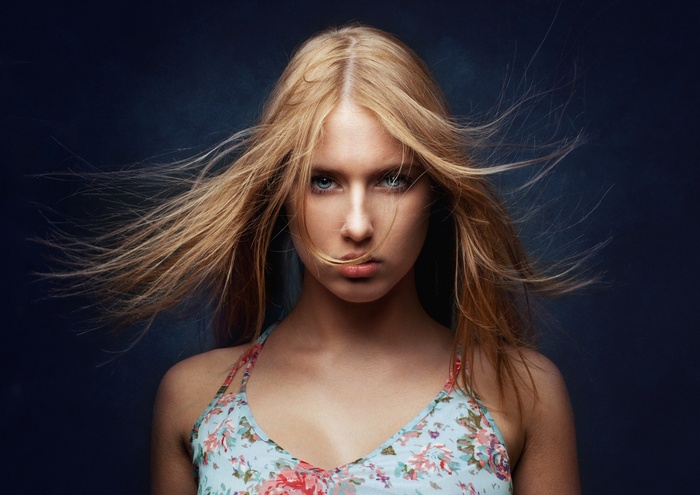 Woman with blonde hair and blue eyes