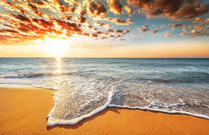 Sunset over the ocean and beach