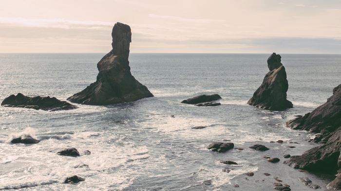Sea stacks and waves on a rocky coastline