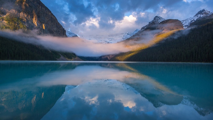 Lake Louise with mountains and mist