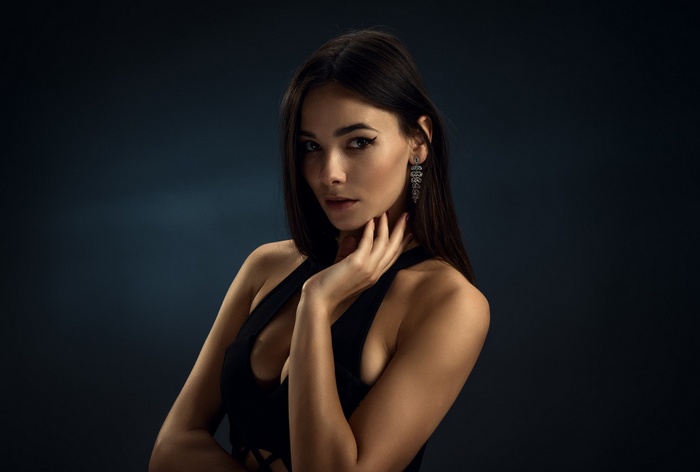 Woman with dark hair and black clothing