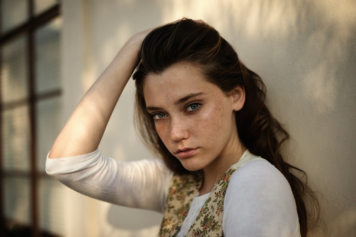 Portrait of Chloe Bechtol with hands on head