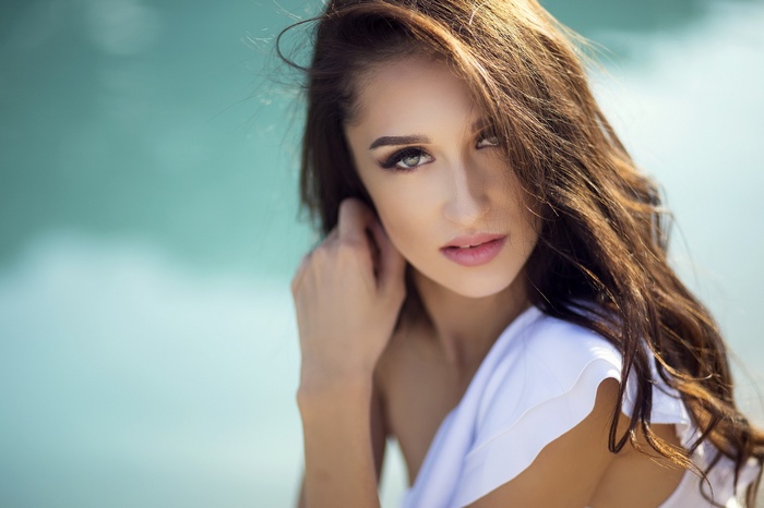 Portrait of a woman with long brown hair
