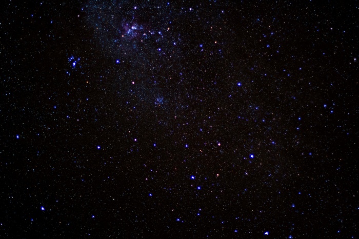 A dark night sky filled with countless stars
