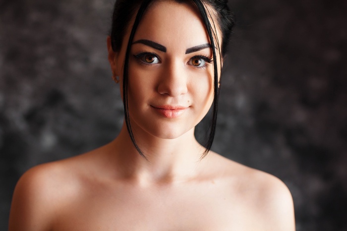 Portrait of a woman with bare shoulders by Aleksei Gilev