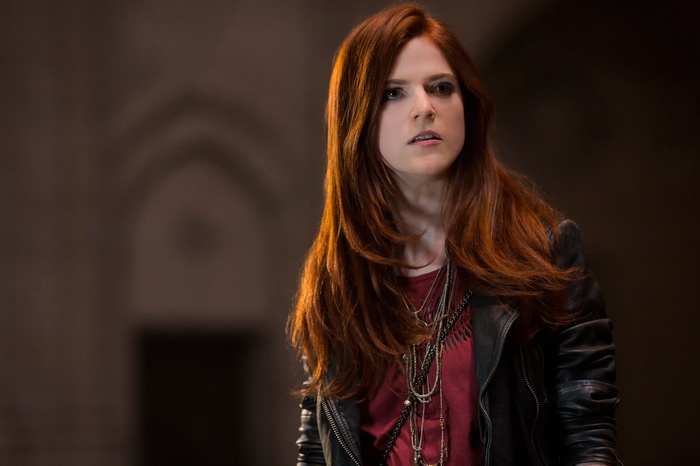 Rose Leslie in a black leather jacket