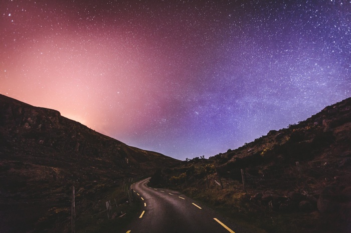 Road under a starry sky