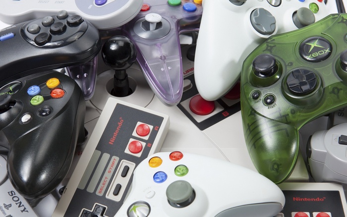 Collection of video game controllers from various consoles