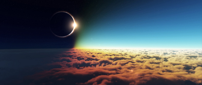 Solar eclipse over clouds at sunrise and sunset
