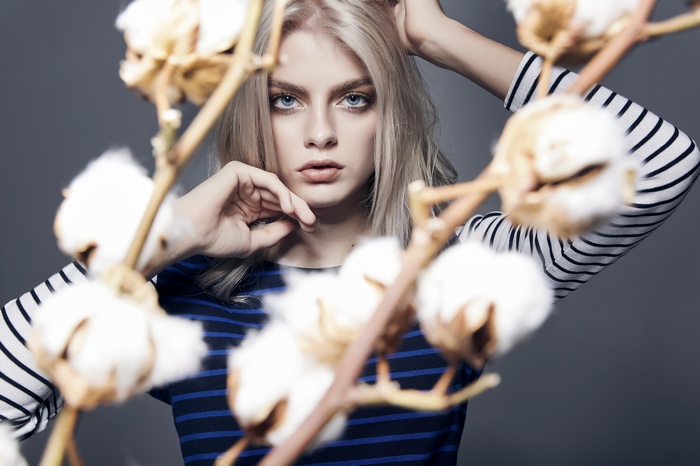 Woman with blonde hair and blue eyes