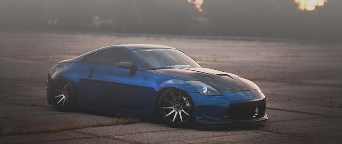 Blue Nissan 350Z sports car with custom modifications