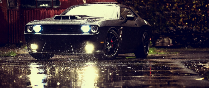 Black Dodge Challenger Hellcat in the rain