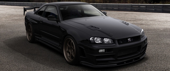 Black Nissan Skyline GT-R on a Racetrack