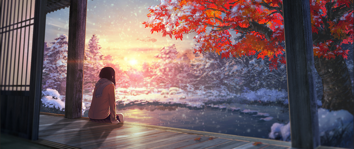 Girl watching sunset in snowy Japan