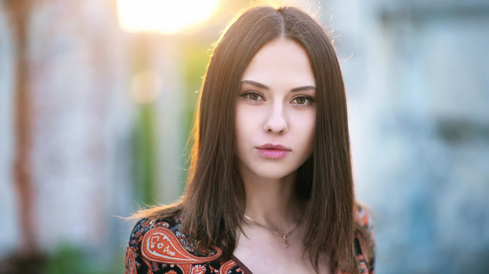 Portrait of Catherine Timokhina with long brown hair