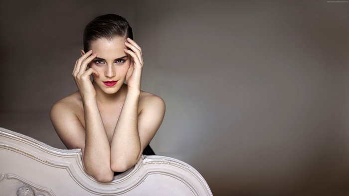 Emma Watson posing with hands on her head