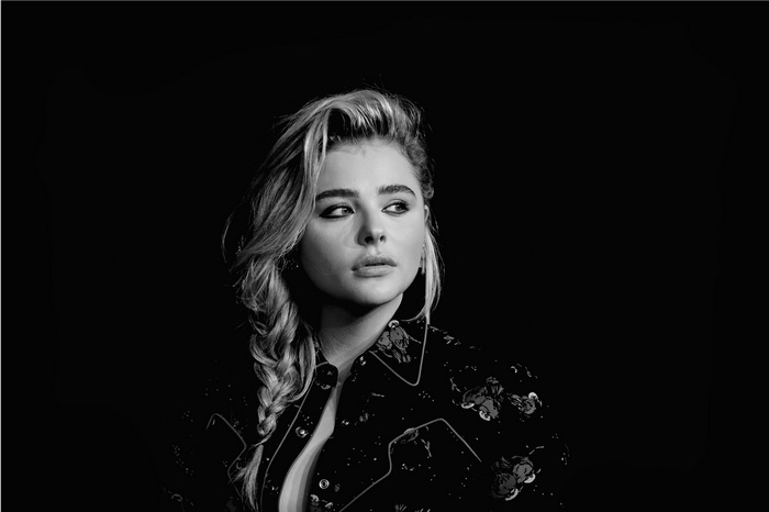 Chloë Grace Moretz in a black patterned shirt