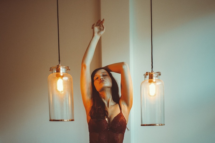 Woman with long hair in red lingerie