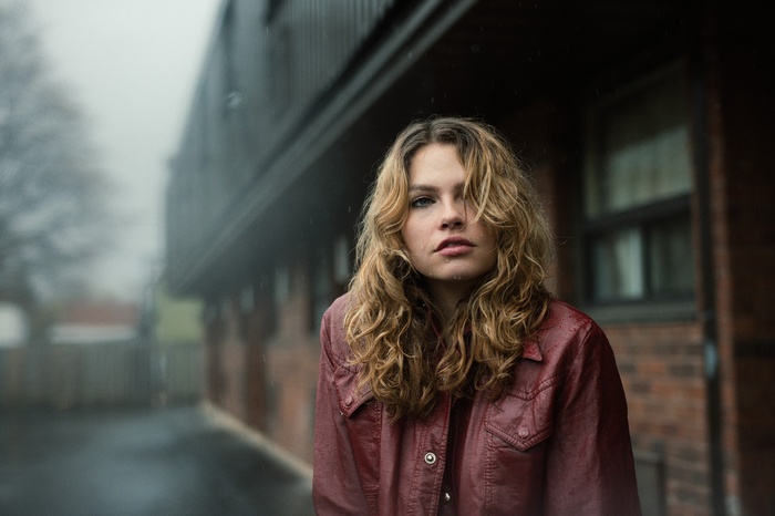 Woman with wavy hair in the rain