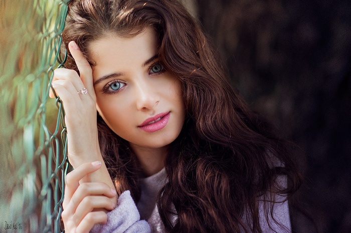 Portrait of a young woman with blue eyes